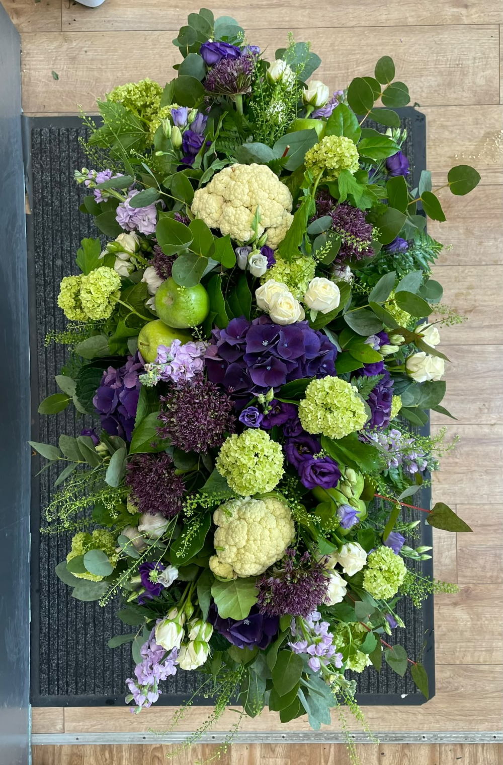 Purple & Green Casket Spray Product Image